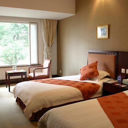 Suzhou Taoyuan International Holiday Hotel חדר תמונה