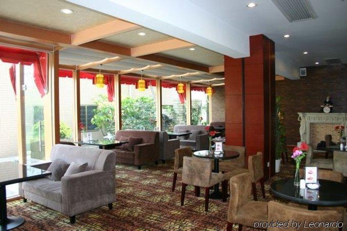 Suzhou Taoyuan International Holiday Hotel מסעדה תמונה